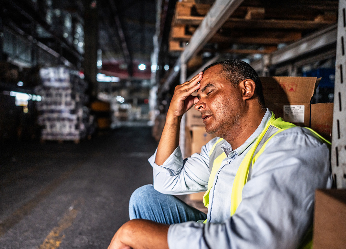 worker looking burnt out