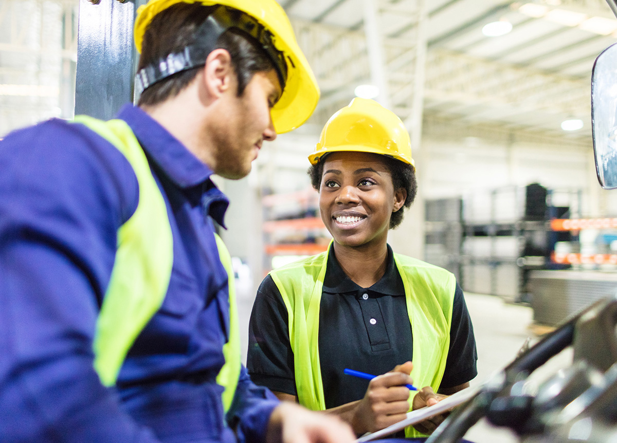 Workers reviewing a checklist